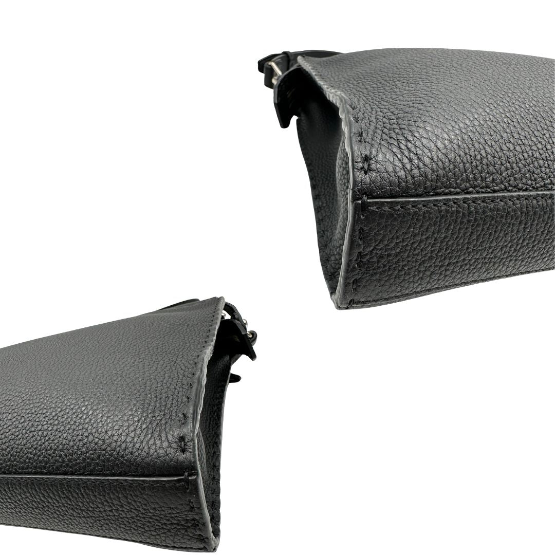 angoli Cartella Fendi in cuoio romano nero con parti metalliche argentate; munita di un manico singolo e una tracolla amovibile, di lusso, originale, usata. 