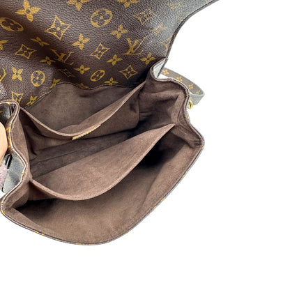Interno di una Borsa Louis Vuitton Métis in canvas marrone monogram con dettagli in vacchetta naturale e parti metalliche dorate. Munita di un manico singolo e una tracolla regolabile e amovibile. Dotata di busta, scatola e dustbag. PRESENZA DI NFC .Originale, usata, di lusso, in ottime condizioni.