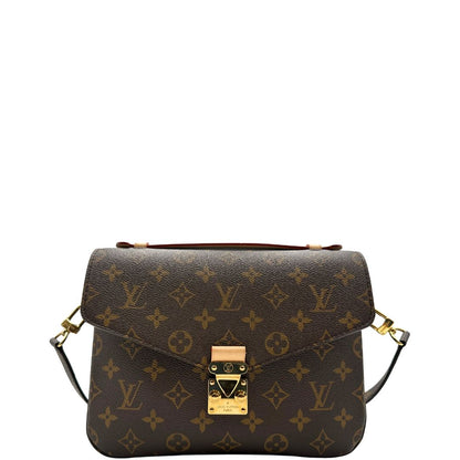 Front di una Borsa Louis Vuitton Métis in canvas marrone monogram con dettagli in vacchetta naturale e parti metalliche dorate. Munita di un manico singolo e una tracolla regolabile e amovibile. Dotata di busta, scatola e dustbag. PRESENZA DI NFC .Originale, usata, di lusso, in ottime condizioni.