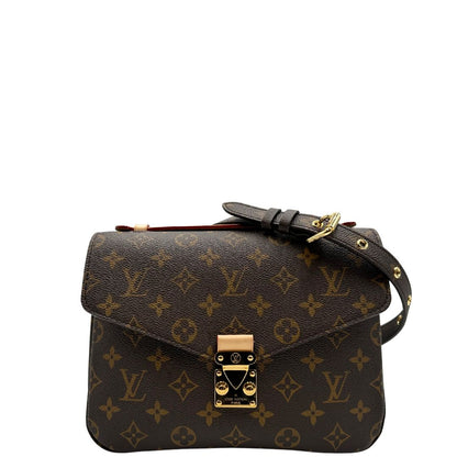 Front di una Borsa Louis Vuitton Métis in canvas marrone monogram con dettagli in vacchetta naturale e parti metalliche dorate. Munita di un manico singolo e una tracolla regolabile e amovibile. Dotata di busta, scatola e dustbag. PRESENZA DI NFC .Originale, usata, di lusso, in ottime condizioni.
