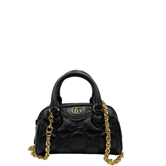 front Borsa Gucci in pelle nera GG con parti metalliche dorate; munita di doppi manici stondati, una tracolla in catena amovibile e una tracolla in tessuto amovibile e regolabile. Completa di dustbag, di lusso, originale, eccellenti condizioni, usata 