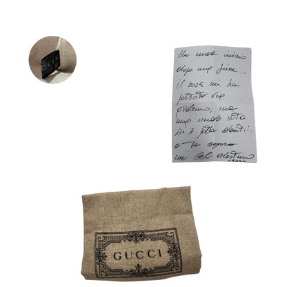 dustbag Borsa Gucci in pelle nera GG con parti metalliche dorate; munita di doppi manici stondati, una tracolla in catena amovibile e una tracolla in tessuto amovibile e regolabile. Completa di dustbag, di lusso, originale, eccellenti condizioni, usata 