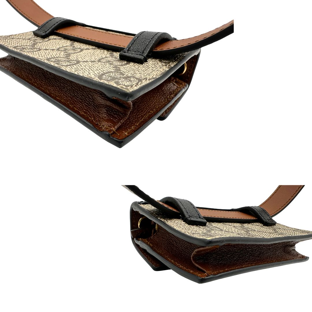 angoli Mini marsupio Gucci in canvas GG beige con finiture in pelle nere e marroni e parti metalliche dorate. Completo di dustbag, eccellenti condizioni, usato, originale. 