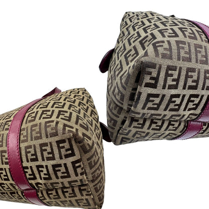 angoli Borsa Fendi in tessuto color tabacco trama Zucchino con finiture in pelle color amaranto e parti metalliche dorate; munita di doppi manici, da portare a spalla, di lusso, buone condizioni, originale. 