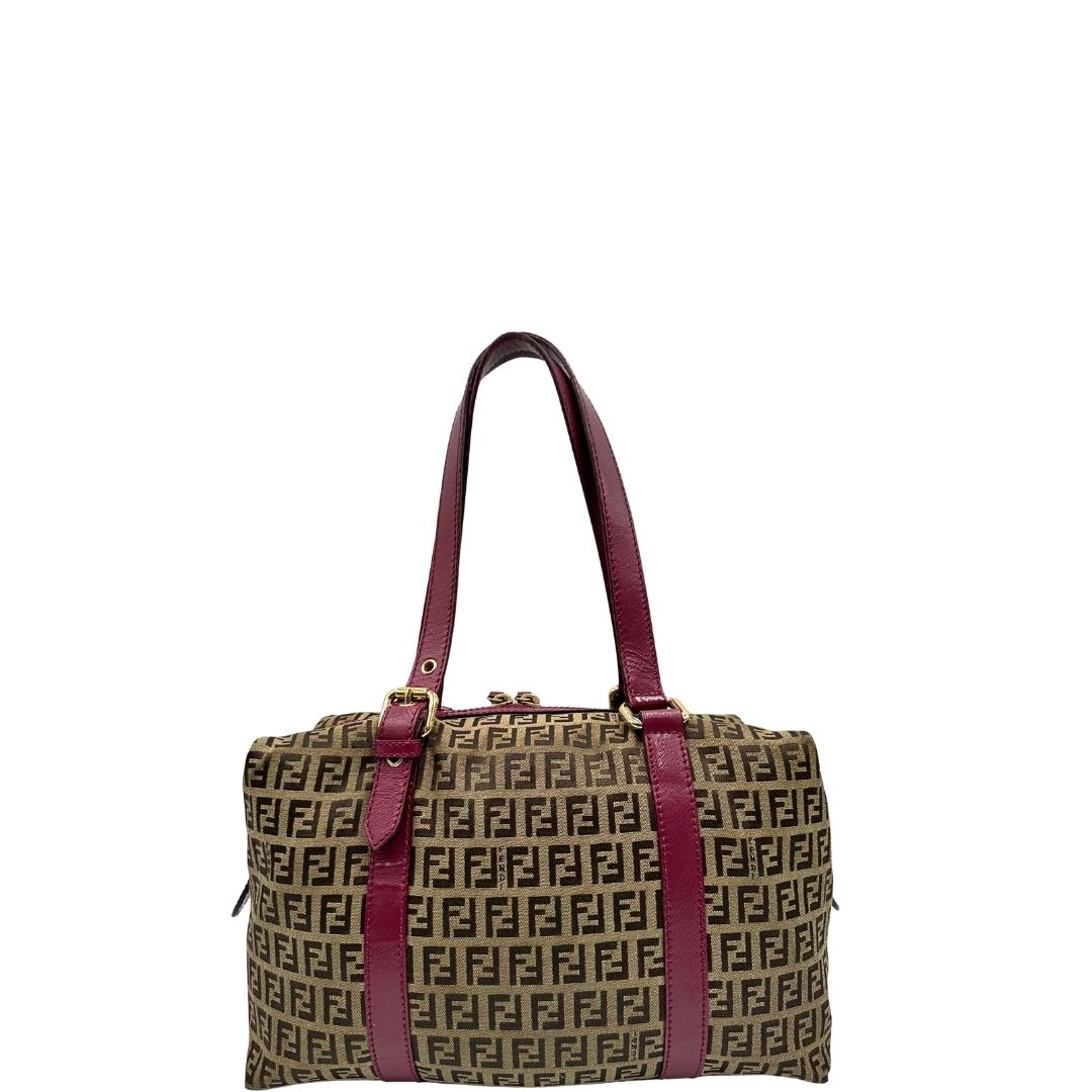 Borsa Fendi in tessuto color tabacco trama Zucchino con finiture in pelle color amaranto e parti metalliche dorate; munita di doppi manici, da portare a spalla, di lusso, buone condizioni, originale. 