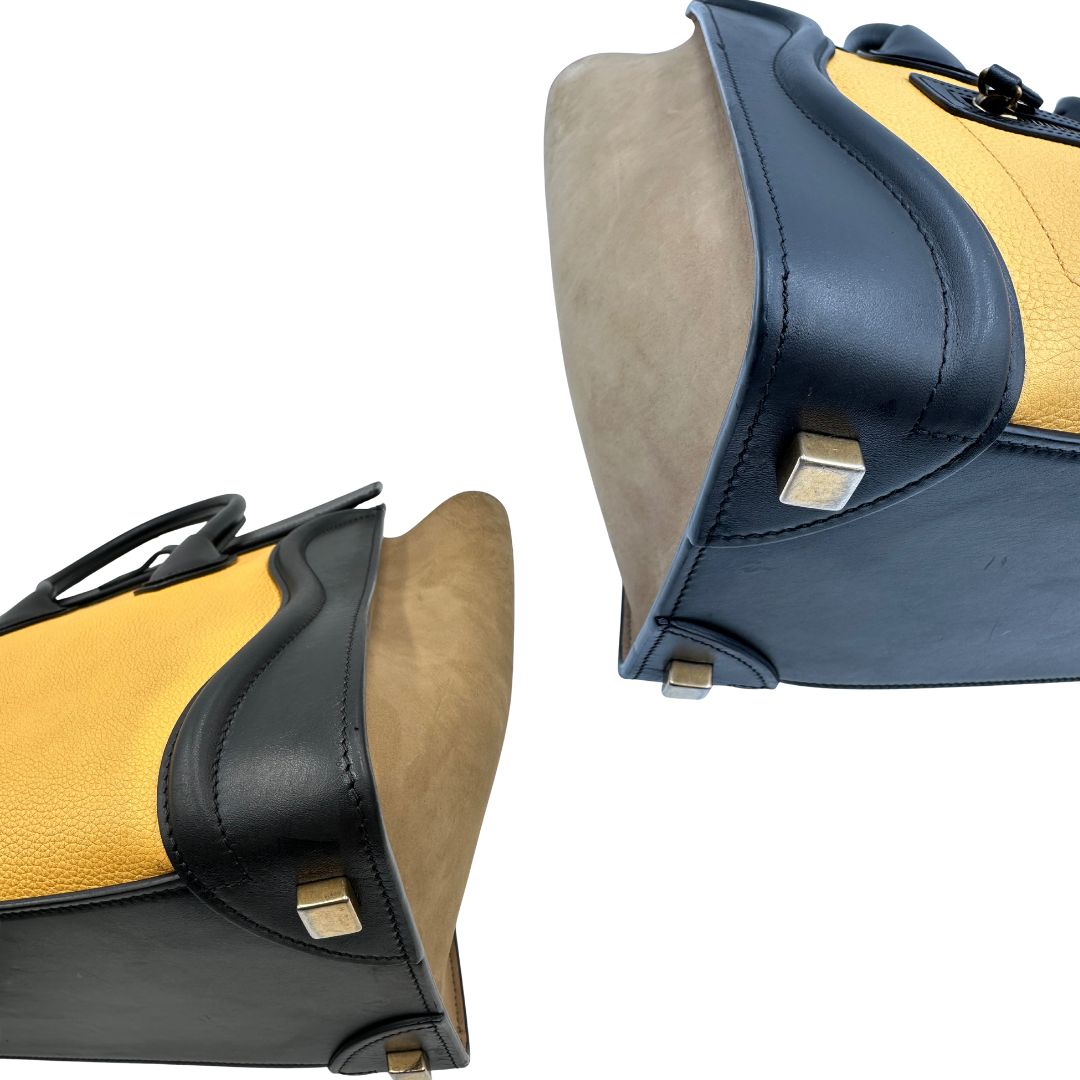 angoli Borsa Céline Luggage in pelle multicolr nera, gialla e laterali in pelle scamosciata beige, con parti metalliche dorate e doppi manici stondati. Completa di dustbag, di lusso, originale, ottime condizioni, usata. 