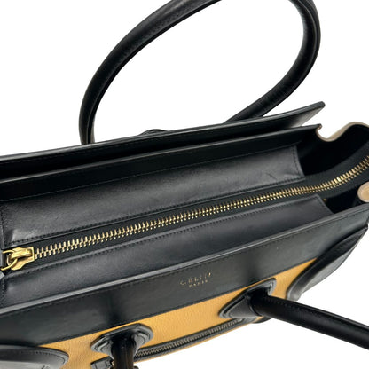 interno Borsa Céline Luggage in pelle multicolr nera, gialla e laterali in pelle scamosciata beige, con parti metalliche dorate e doppi manici stondati. Completa di dustbag, di lusso, originale, ottime condizioni, usata. 