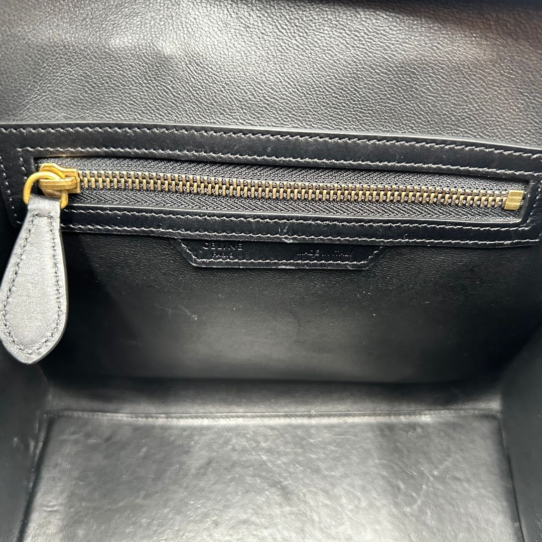 interno Borsa Céline Luggage in pelle multicolr nera, gialla e laterali in pelle scamosciata beige, con parti metalliche dorate e doppi manici stondati. Completa di dustbag, di lusso, originale, ottime condizioni, usata. 