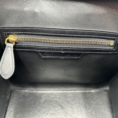 interno Borsa Céline Luggage in pelle multicolr nera, gialla e laterali in pelle scamosciata beige, con parti metalliche dorate e doppi manici stondati. Completa di dustbag, di lusso, originale, ottime condizioni, usata. 