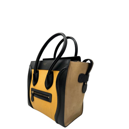 lato Borsa Céline Luggage in pelle multicolr nera, gialla e laterali in pelle scamosciata beige, con parti metalliche dorate e doppi manici stondati. Completa di dustbag, di lusso, originale, ottime condizioni, usata. 