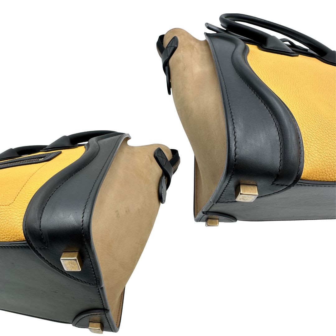 angoli Borsa Céline Luggage in pelle multicolr nera, gialla e laterali in pelle scamosciata beige, con parti metalliche dorate e doppi manici stondati. Completa di dustbag, di lusso, originale, ottime condizioni, usata. 