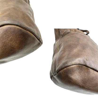 angoli Borsa Nightingale Givenchy in pelle marrone con parti metalliche dorate; munita di doppi manici e un manico singolo amovibile, da portare a spalla o a mano. Completa di dustbag, di lusso, originale, ottime condizioni, usata 