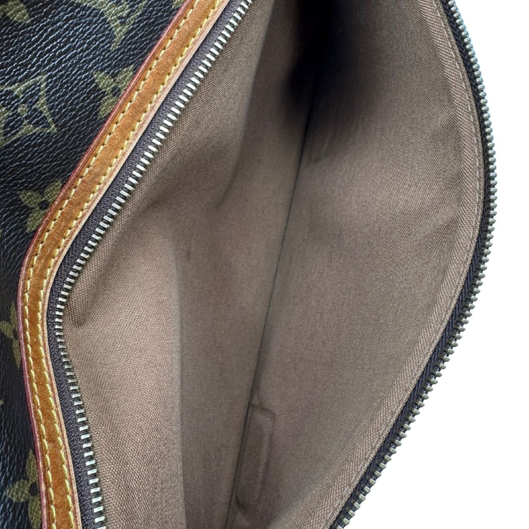 interno Borsa Messenger Bosphore Louis Vuitton in canvas marrone monogram con finiture in vacchetta naturale, tracolla in tessuto regolabile e parti metalliche dorate, di lusso, originale, ottime condizioni, usata.