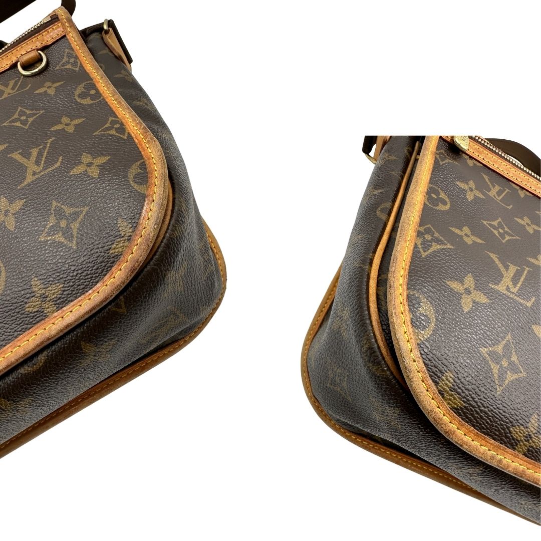 angoli Borsa Messenger Bosphore Louis Vuitton in canvas marrone monogram con finiture in vacchetta naturale, tracolla in tessuto regolabile e parti metalliche dorate, di lusso, originale, ottime condizioni, usata. 