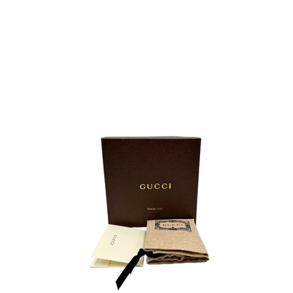 Cintura Gucci in pelle nera con finiture rosse e parti metalliche dorate. Completa di dustbag e scatola, di lusso, originale, ottime condizioni.