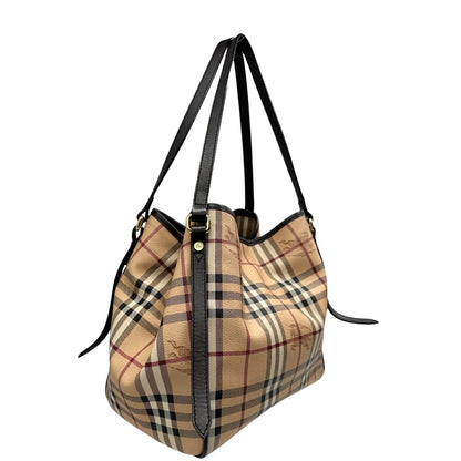 lato Borsa Burberry in canvas trama tartan sui toni del beige con finiture in pelle nere e parti metalliche dorate; munita di doppi manici, indossabile a spalla. Munita di pochette estraibile. Completa di dustbag, di lusso, originale, ottime condizioni, usata. 