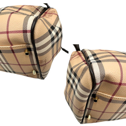 angoli Borsa Burberry in canvas trama tartan sui toni del beige con finiture in pelle nere e parti metalliche dorate; munita di doppi manici, indossabile a spalla. Munita di pochette estraibile. Completa di dustbag, di lusso, originale, ottime condizioni, usata. 
