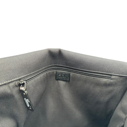 interno Borsa Gucci in tessuto nero con finiture in pelle tono su tono; munita di una tracolla in tessuto regolabile, di lusso, originale, ottime condizioni, usata. 