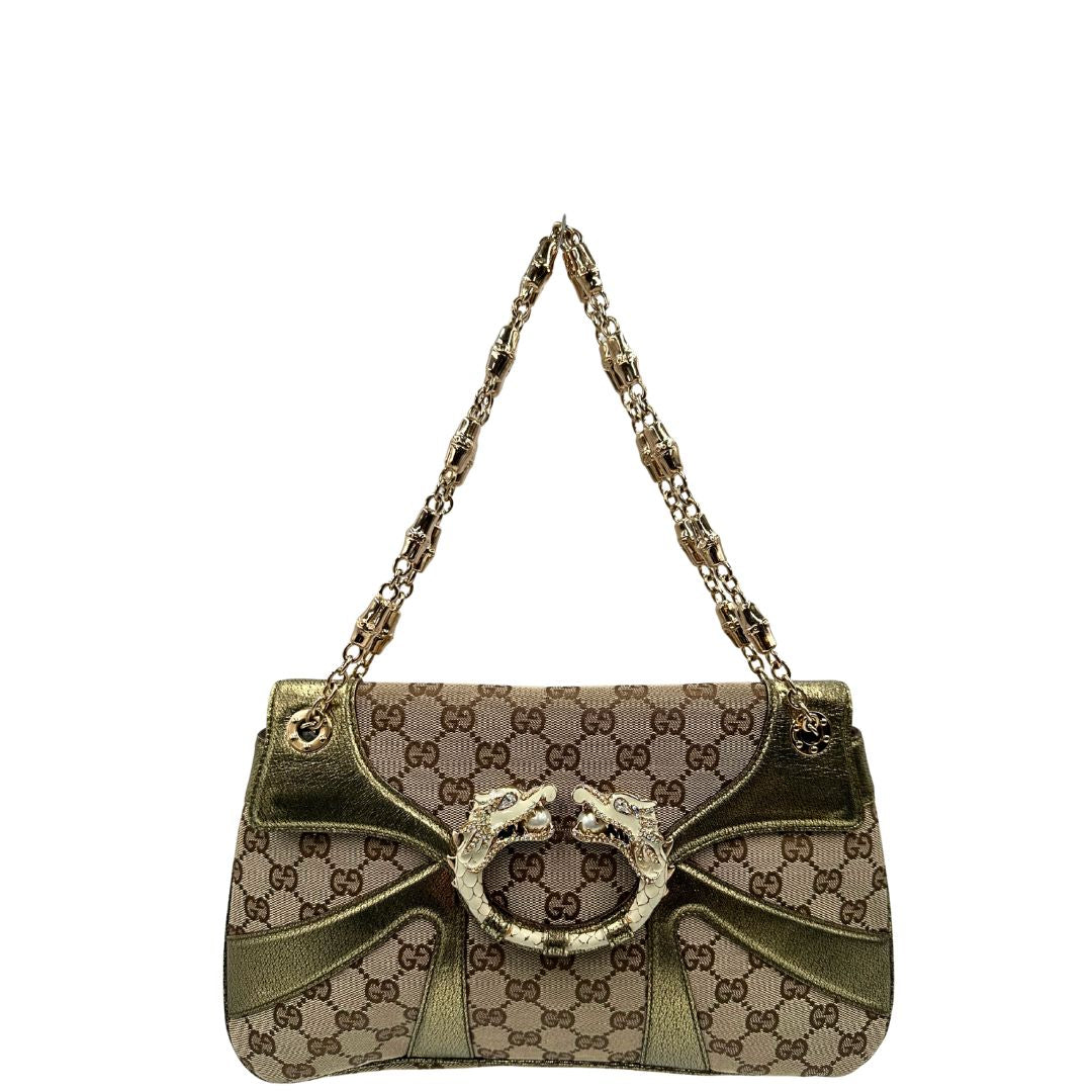 front  Borsa Gucci in tessuto GG beige con finiture in pelle e parti metalliche dorate; munita di doppi manici in catena, indossabile a spalla, di lusso, originale, ottime condizioni, usata. 