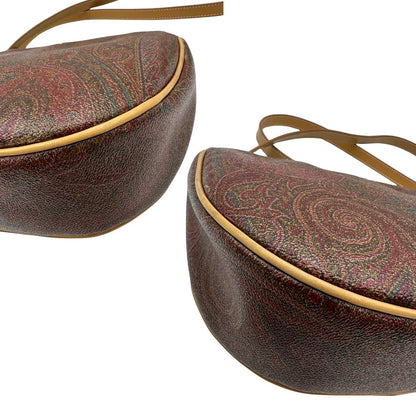 angoli Borsa Etro in canvas multicolore trama Paisley con parti metalliche dorate e finiture in pelle; munita di una tracolla, di lusso, originale, ottime condizioni, usata. 