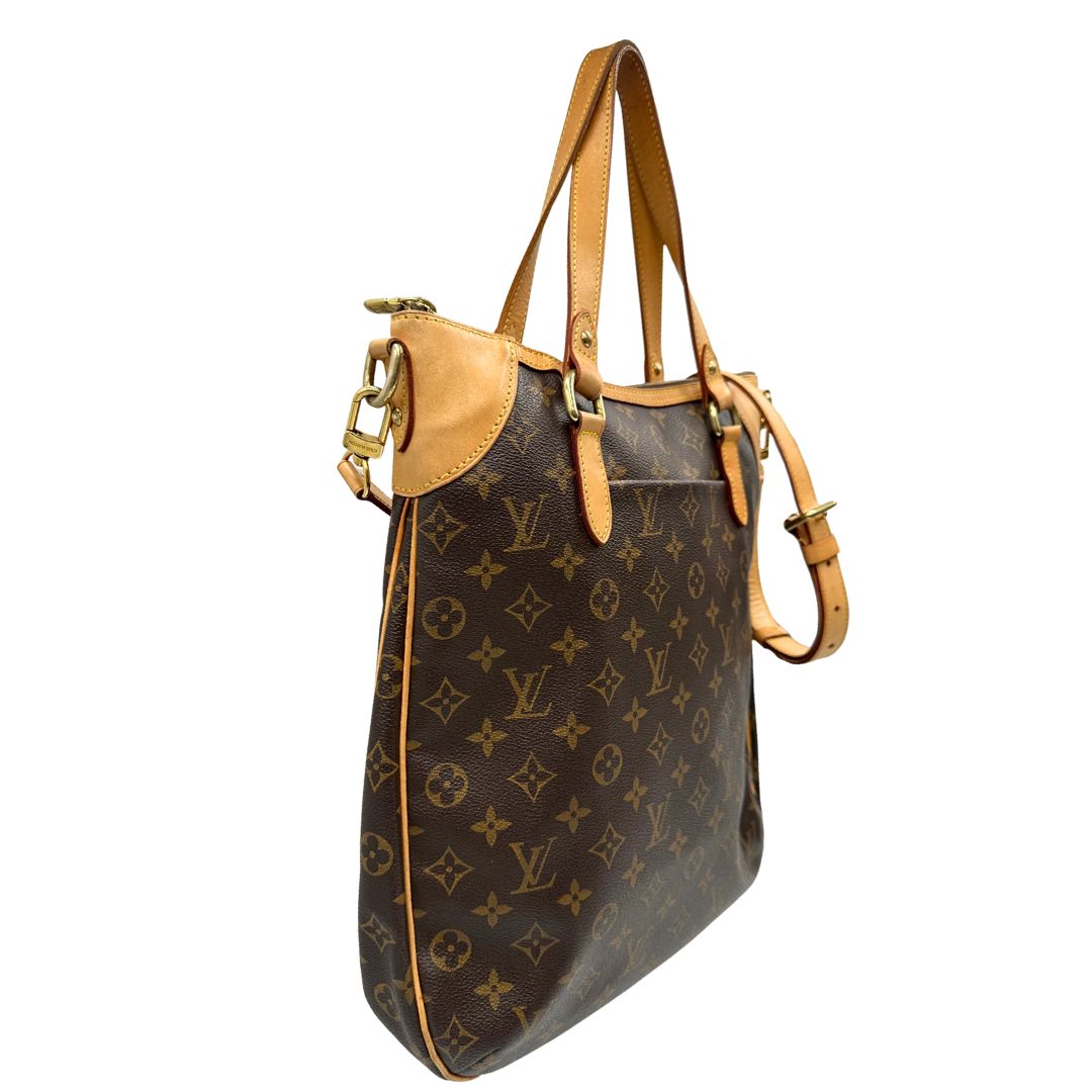 lato Borsa Louis Vuitton Métis in canvas marrone monogram con dettagli in vacchetta naturale e parti metalliche dorate. Munita di doppi manici e una tracolla regolabile e amovibile, di lusso, originale, ottime condizioni, usata, originale. 