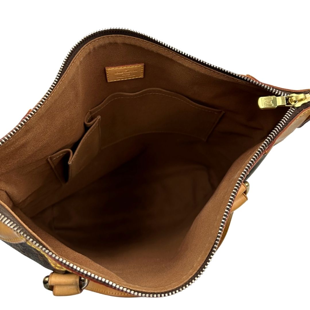 interno Borsa Louis Vuitton Métis in canvas marrone monogram con dettagli in vacchetta naturale e parti metalliche dorate. Munita di doppi manici e una tracolla regolabile e amovibile, di lusso, originale, ottime condizioni, usata, originale. 