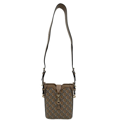 front Borsa Gucci in canvas GG color tortora e parti metalliche dorate; munita di una tracolla leggermente regolabile. Completa di dustbag, di lusso, originale, eccellenti condizioni. 