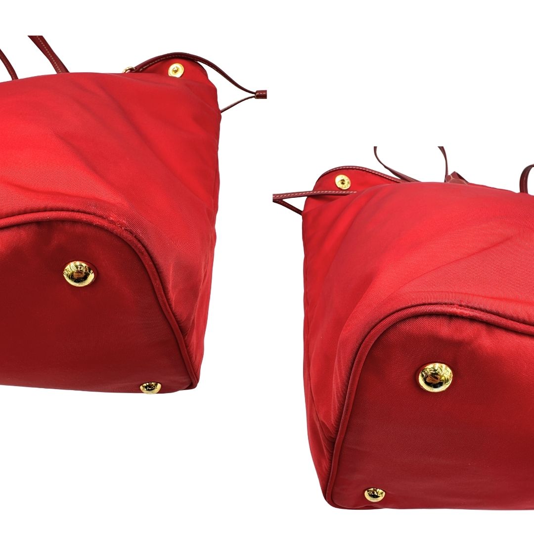 Angoli di una Borsa Prada in nylon rosso con parti metalliche dorate e finiture in pelle tono su tono, munita di doppi manici, indossabile a spalla. Completa di dustbag. Originale, usata, di lusso, in ottime condizioni.