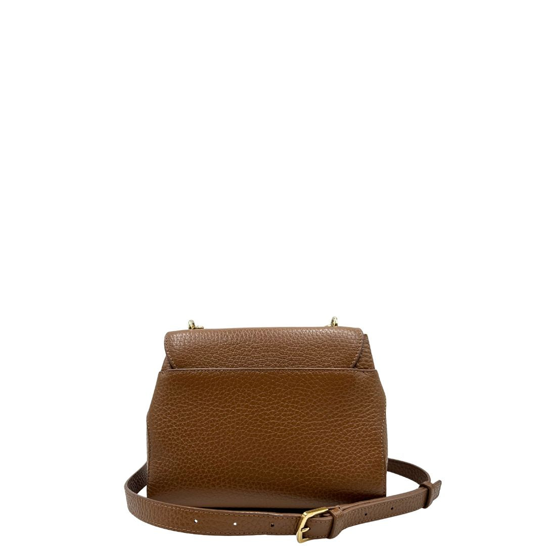 retro  Borsa Furla in pelle martellata marrone e parti metalliche dorate; munita di un manico singolo e una tracolla regolabile. Completa di dustbag, di lusso, originale, ottime condizioni, usata. 