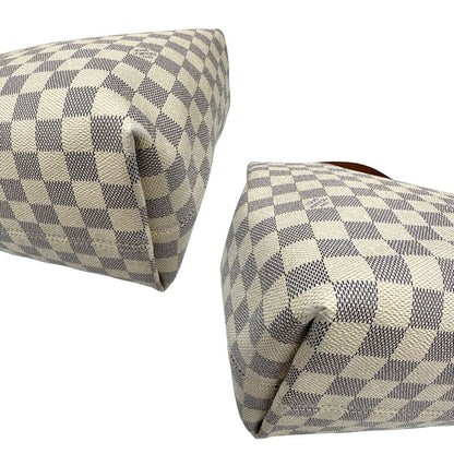 angoli Borsa Louis Vuitton in canvas damier azur con finiture in vacchetta naturale e parti metalliche dorate; munita di un manico singolo, indossabile a spalla, di lusso, originale, ottime condizioni, usata. 