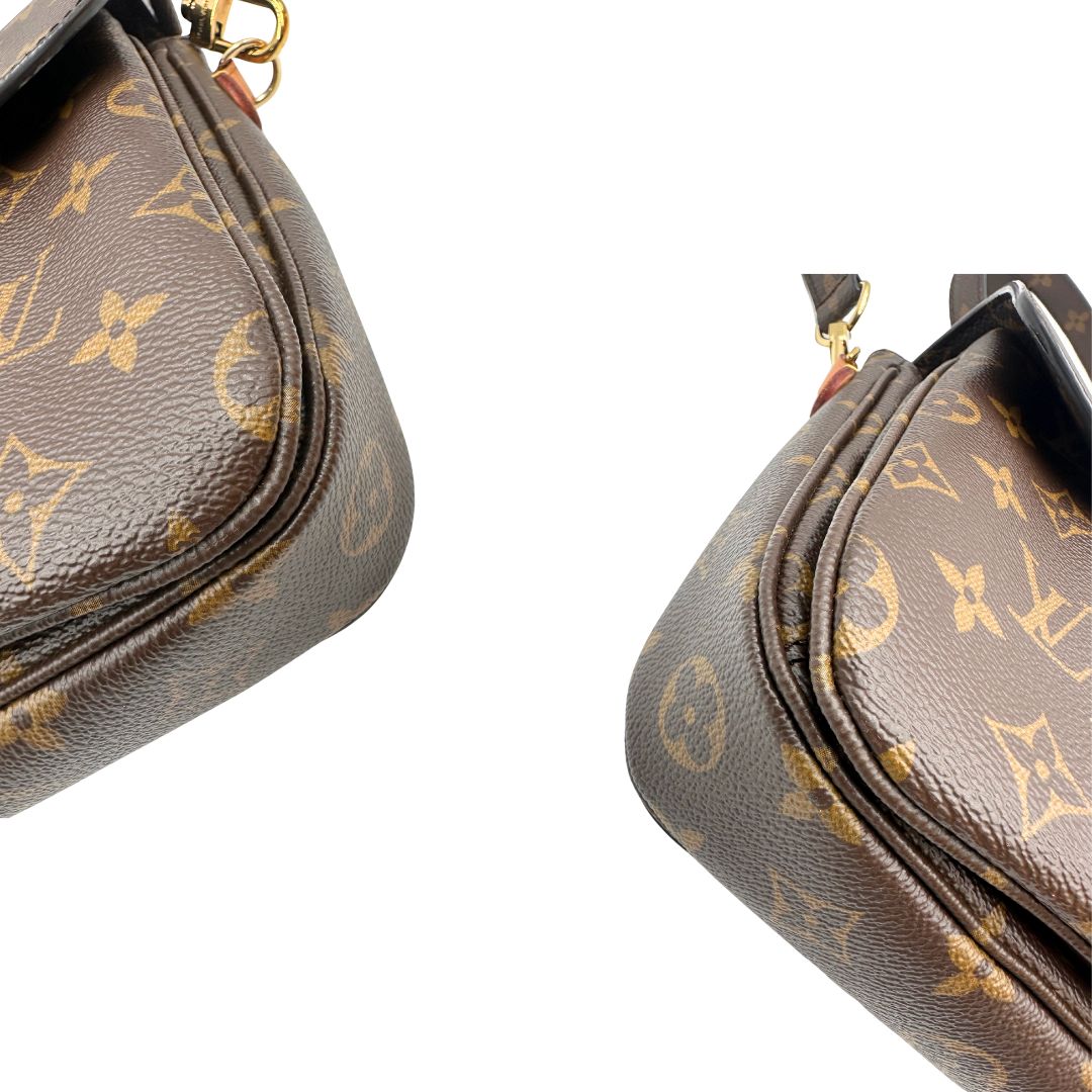 angoli Borsa Louis Vuitton Métis in canvas marrone monogram con dettagli in vacchetta naturale e parti metalliche dorate. Munita di un manico singolo e una tracolla regolabile e amovibile, di lusso, originale, ottime condizioni, usata. 