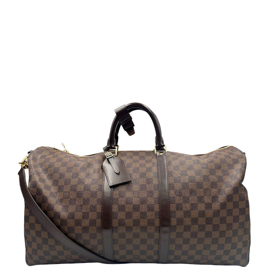 front Borsone Louis Vuitton in canvas Damier Ébène marrone con finiture in pelle tono su tono e parti metalliche dorate; munito di doppi manici stondati e una tracolla amovibile e regolabile. Completo di lucchetto, chiavi e dustbag, di lusso, originale, ottime condizioni, usato. 