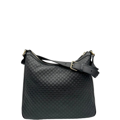 retro Borsa Gucci in pelle nera GG con parti metalliche dorate; munita di una tracolla regolabile, di lusso, originale, ottime condizioni, usata. 