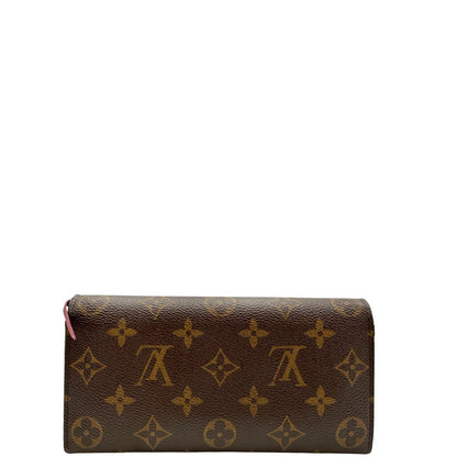 Retro di un Portafoglio Louis Vuitton Sarah in canvas monogrammato marrone e parti metalliche dorate con bottoncino amaranto. Completo di scatola. Originale, usata, di lusso, in ottime condizioni.