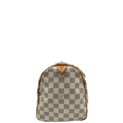 lato Borsa Speedy 30 Louis Vuitton in canvas Damier Azur con finiture in vacchetta naturale e parti metalliche dorate. Completo di lucchetto, chiavi e corredo, di lusso, originale, ottime condizioni, usata. 