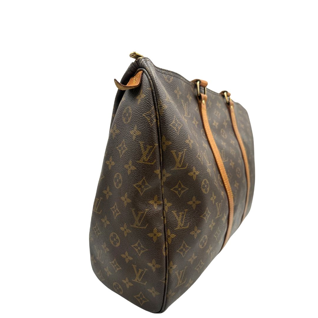 lato  Borsa Louis Vuitton in canvas marrone monogram con finiture in vacchetta naturale e parti metalliche dorate; munita di doppi manici, indossabile a spalla. Completa di dustbag, di lusso, originale, ottime condizioni, usata. 