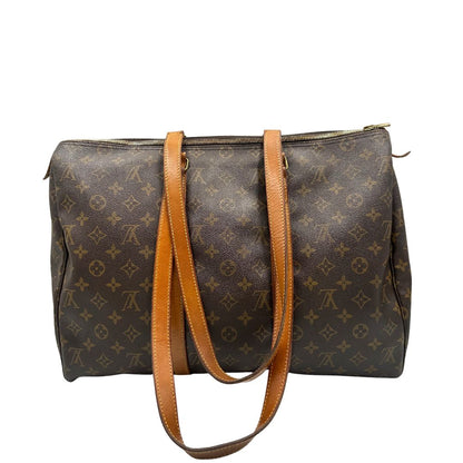 retro Borsa Louis Vuitton in canvas marrone monogram con finiture in vacchetta naturale e parti metalliche dorate; munita di doppi manici, indossabile a spalla. Completa di dustbag, di lusso, originale, ottime condizioni, usata.