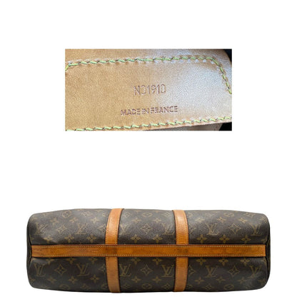 base e codice  Borsa Louis Vuitton in canvas marrone monogram con finiture in vacchetta naturale e parti metalliche dorate; munita di doppi manici, indossabile a spalla. Completa di dustbag, di lusso, originale, ottime condizioni, usata. 