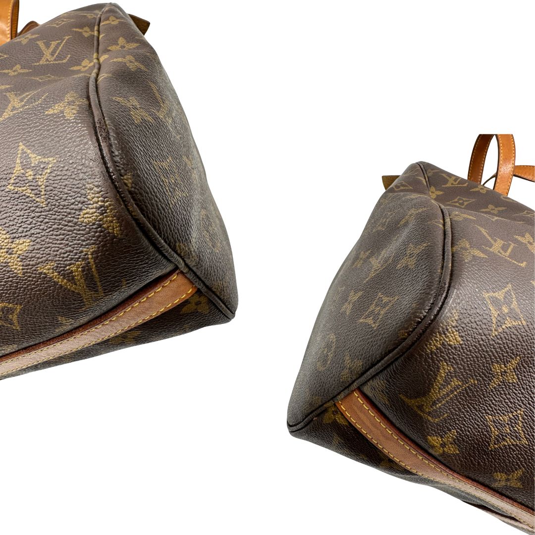 angoli Borsa Louis Vuitton in canvas marrone monogram con finiture in vacchetta naturale e parti metalliche dorate; munita di doppi manici, indossabile a spalla. Completa di dustbag, di lusso, originale, ottime condizioni, usata.