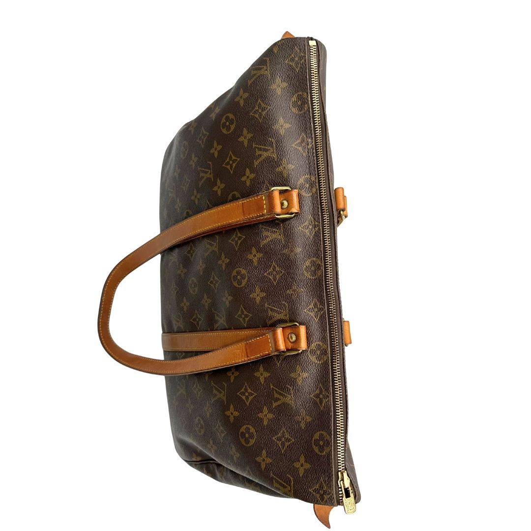 chiusura  Borsa Louis Vuitton in canvas marrone monogram con finiture in vacchetta naturale e parti metalliche dorate; munita di doppi manici, indossabile a spalla. Completa di dustbag, di lusso, originale, ottime condizioni, usata. 