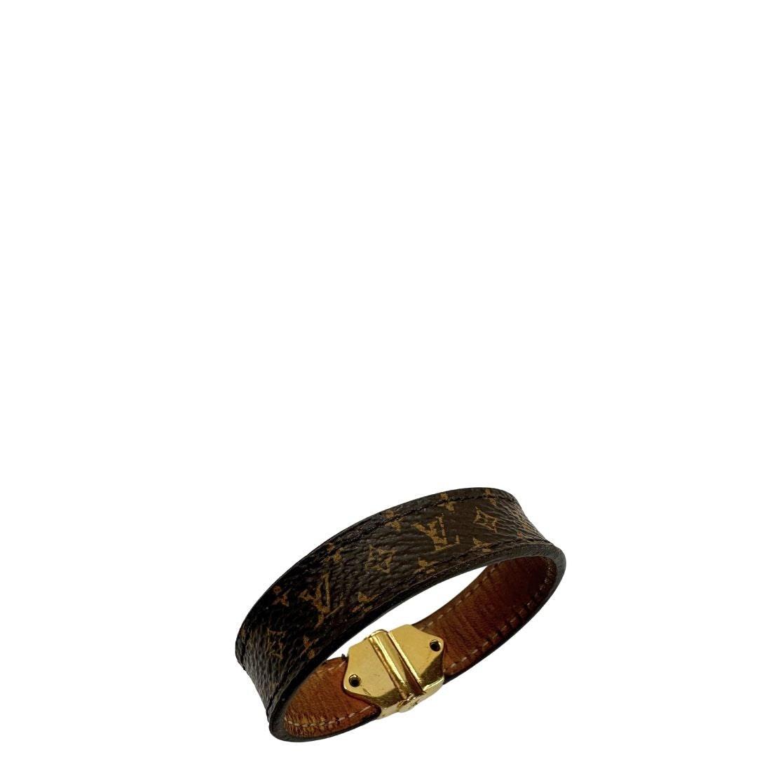  Bracciale Louis Vuitton in canvas marrone monogram e dettagli metallici dorati. Full set, di lusso, originale, ottime condizioni, usato.