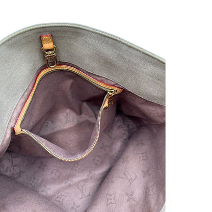 Tasca interna di una Borsa Louis Vuitton Limited Edition in tela beige con dettagli in pelle scamosciata marrone e in vacchetta naturale, parti metalliche dorate; munita di doppi manici in tessuto, indossabile a spalla. Completa di dustbag. Originale, usata, di lusso, in ottime condizioni