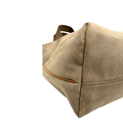 Borsa Louis Vuitton Limited Edition in tela beige con dettagli in pelle scamosciata marrone e in vacchetta naturale, parti metalliche dorate; munita di doppi manici in tessuto, indossabile a spalla. Completa di dustbag. Originale, usata, di lusso, in ottime condizioni