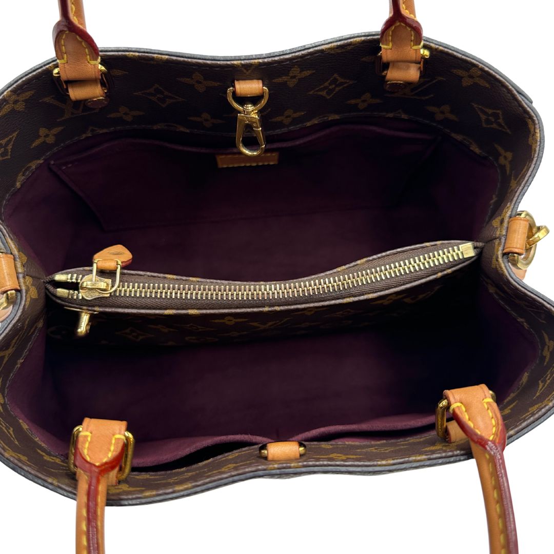 interno  Borsa Louis Vuitton in canvas marrone monogram con finiture in vacchetta naturale e parti metalliche dorate; munita di doppi manici stondati, e una tracolla amovibile, di lusso, originale, ottime condizioni, usata. 