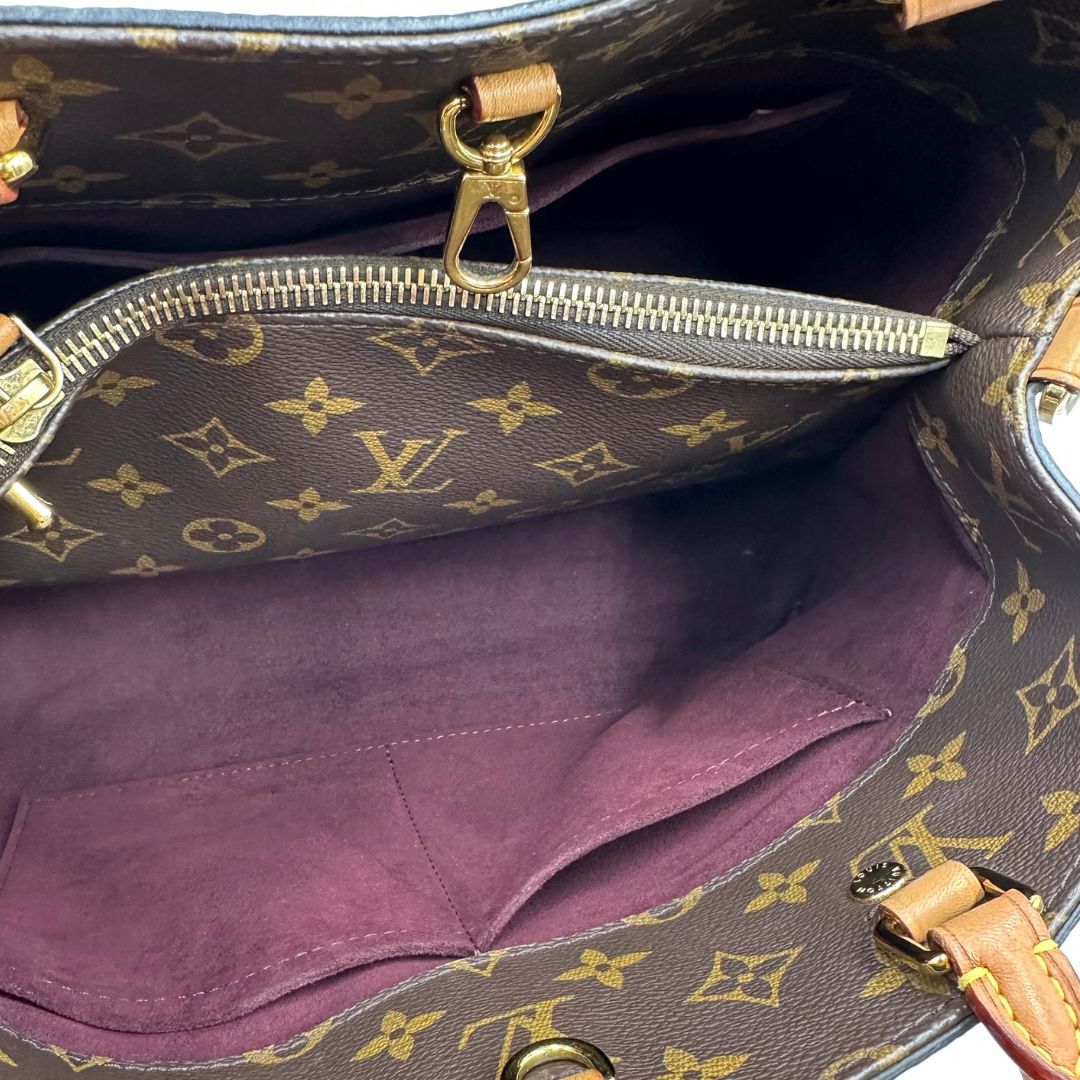 interno  Borsa Louis Vuitton in canvas marrone monogram con finiture in vacchetta naturale e parti metalliche dorate; munita di doppi manici stondati, e una tracolla amovibile, di lusso, originale, ottime condizioni, usata. 