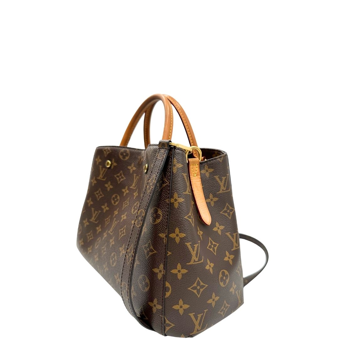 lato  Borsa Louis Vuitton in canvas marrone monogram con finiture in vacchetta naturale e parti metalliche dorate; munita di doppi manici stondati, e una tracolla amovibile, di lusso, originale, ottime condizioni, usata. 