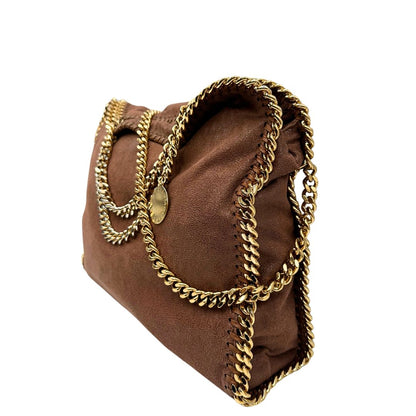 lato Borsa Stella McCartney Falabella in tessuto vegano color cameo rifinita con catene in metallo dorato. Completa di dustbag, di lusso, originale, ottime condizioni, usata. 