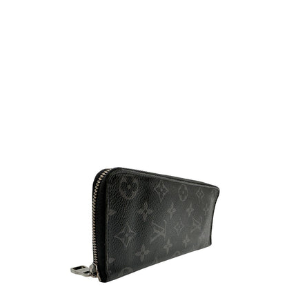 lato  Portafoglio Louis Vuitton in canvas monogram eclipse nero con parti metalliche argentate. Full set, di lusso, originale, ottime condizioni. 