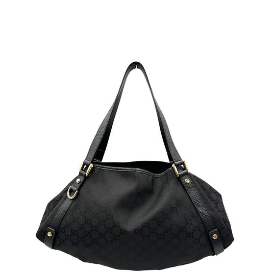 front  Borsa Gucci in tessuto nero GG con finiture in pelle tono su tono e parti metalliche dorate; munita di doppi manici, indossabile a spalla. Completa di dustbag, di lusso, originale, ottime condizioni, usata. 