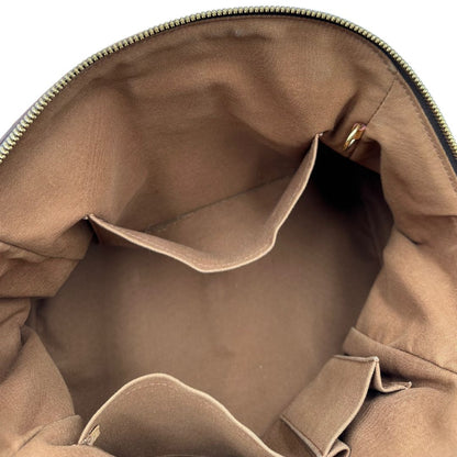 interno  Borsa Louis Vuitton in canvas marrone monogram con finiture in vacchetta naturale e parti metalliche dorate; munita di doppi manici regolabile, da portare a mano o a spalla. Dotata di dustbag, di lusso, originale, ottime condizioni, usata. 